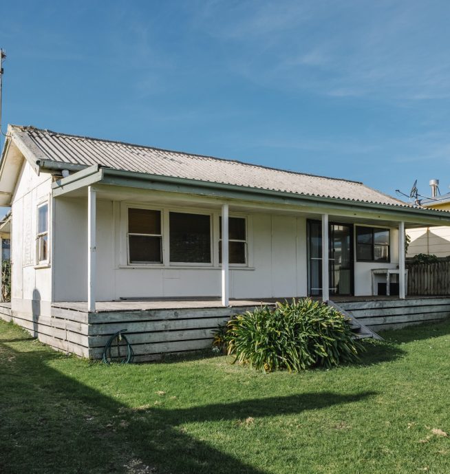 old white house and garden