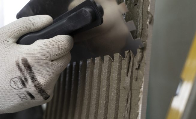 tiler-working-renovation-apartment